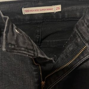 720 black high rise super skinny jeans
